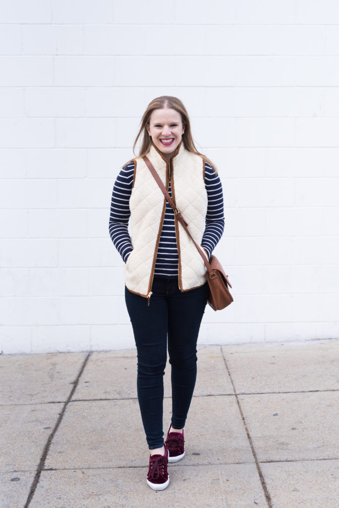 woman blogger wearing puffer vest