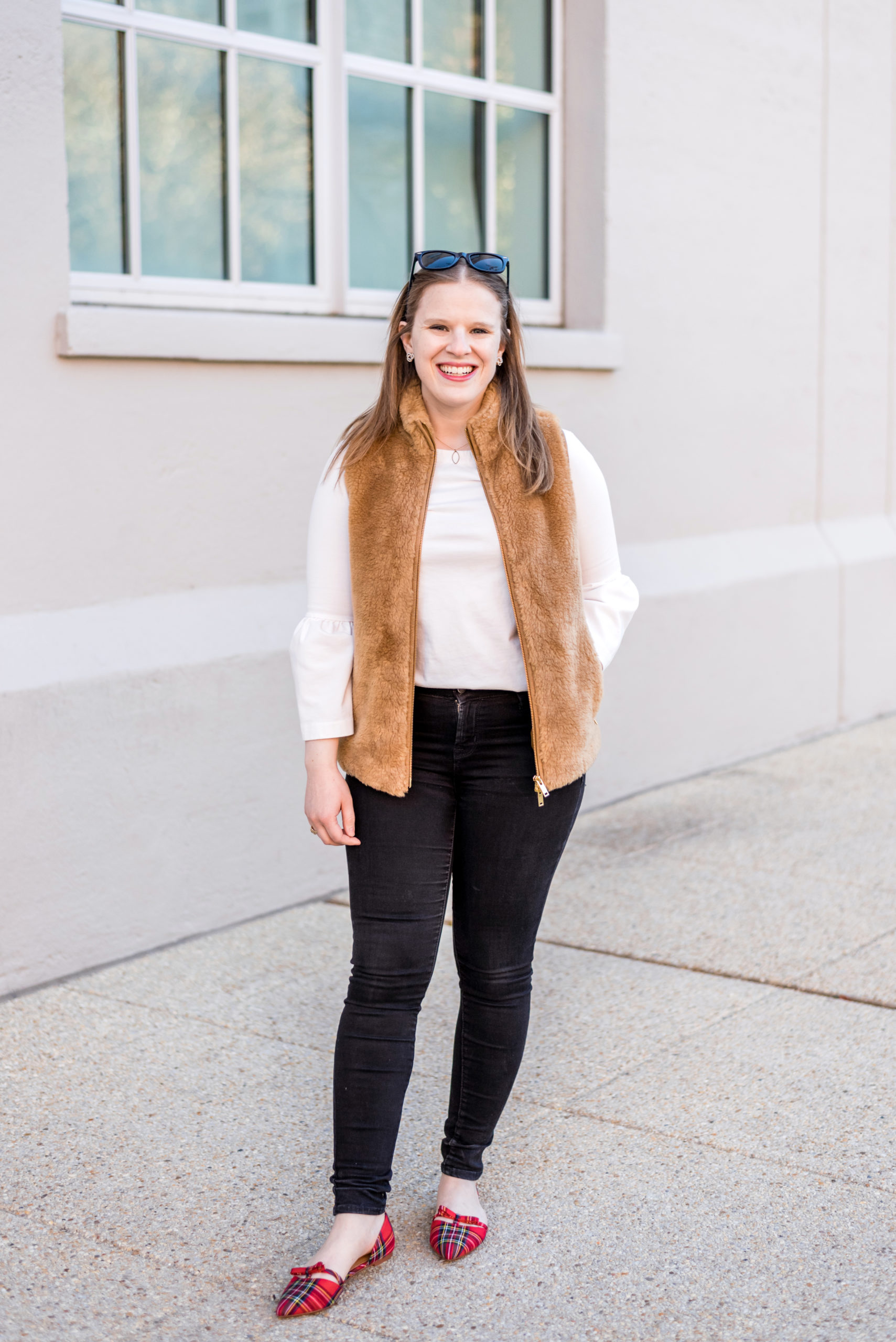 woman blogger wearing tartan flats