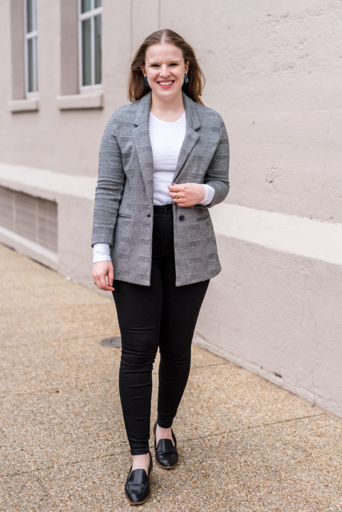 woman blogger wearing blazer with loafers
