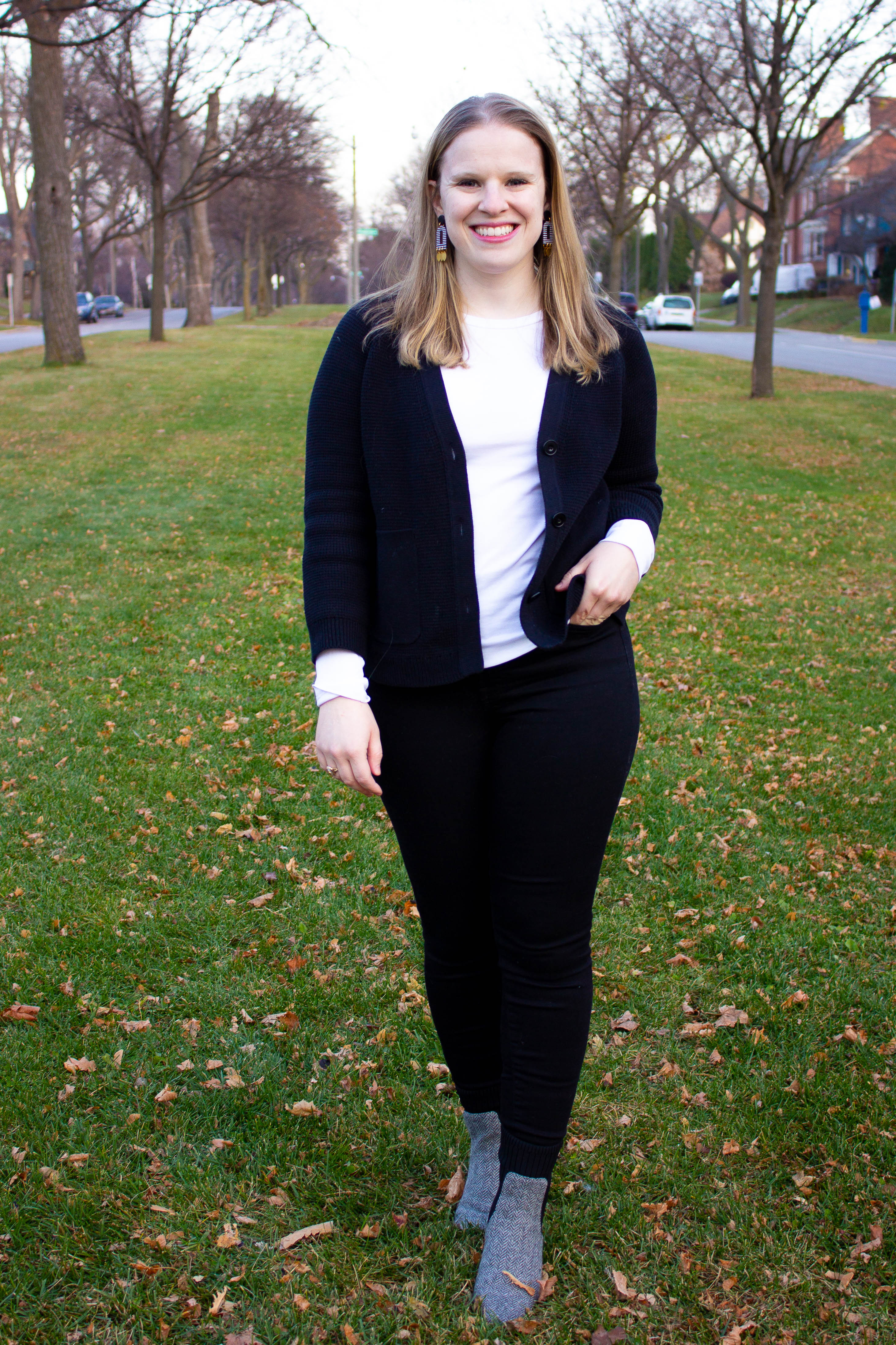 woman blogger wearing J.Crew cardigan and ankle boots