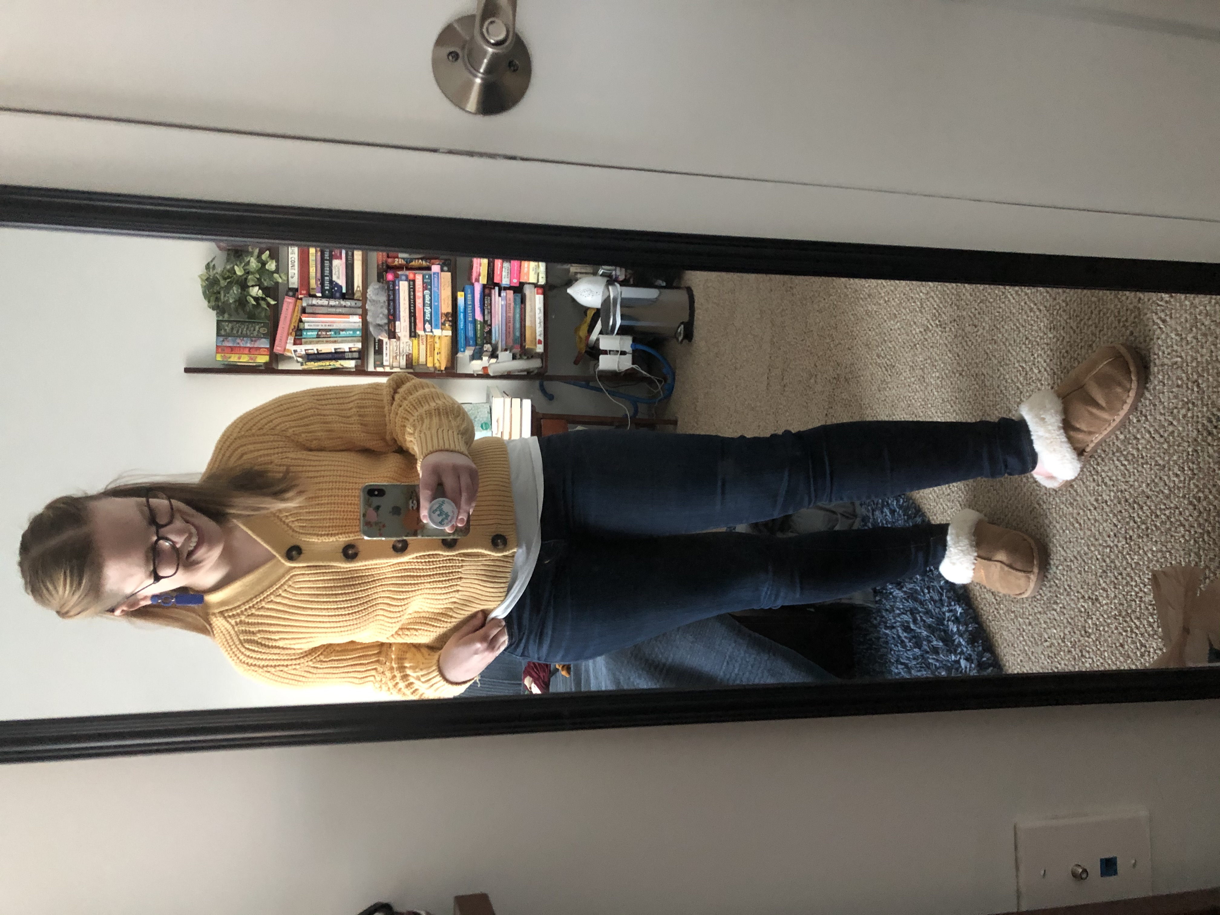 woman blogger taking a mirror selfie wearing Everlane sweater