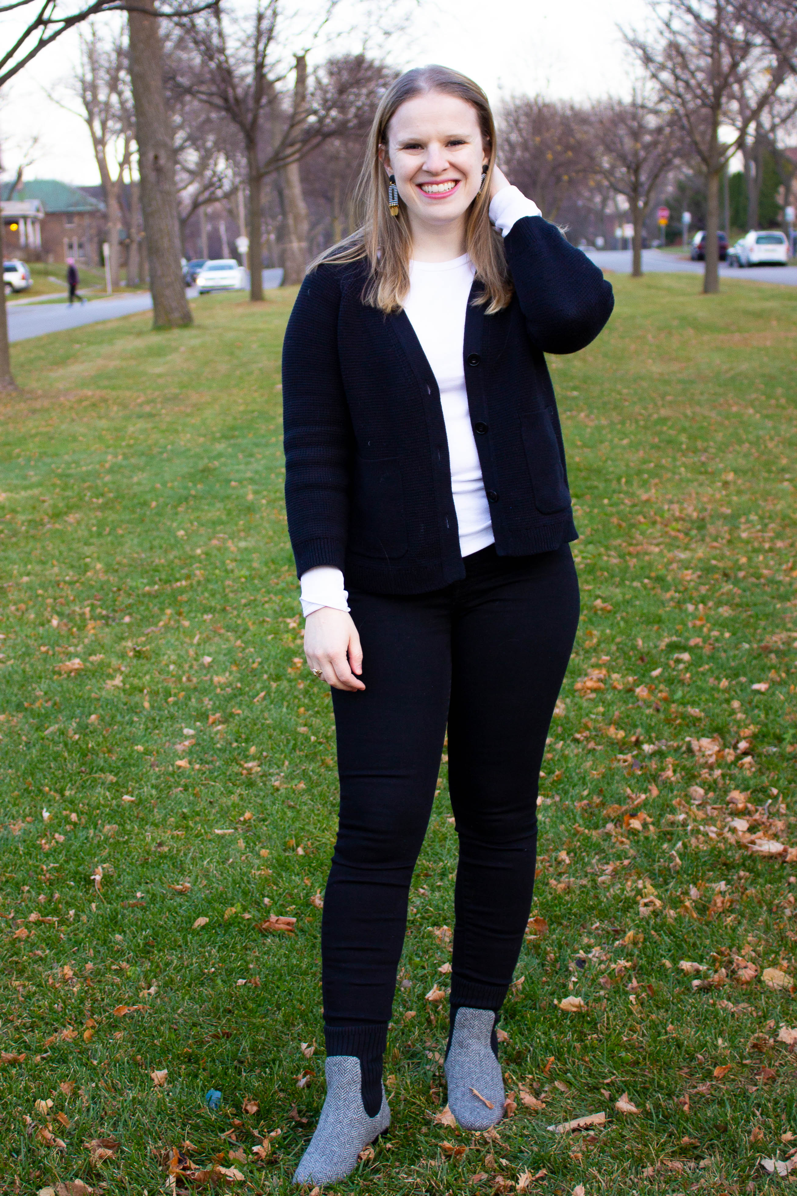 woman blogger wearing J.Crew black knit cardigan