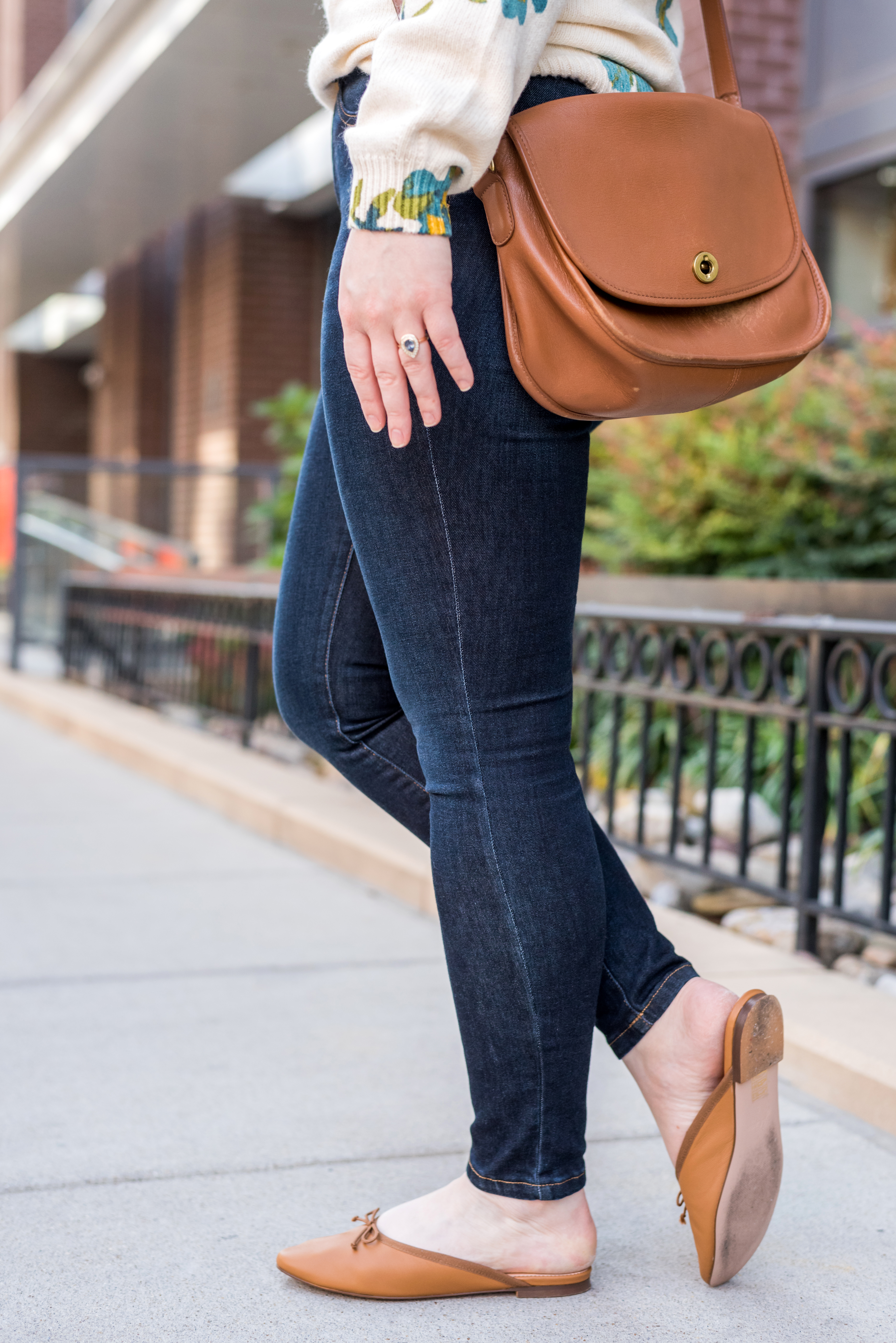 woman wearing madewell denim and j.crew mules 