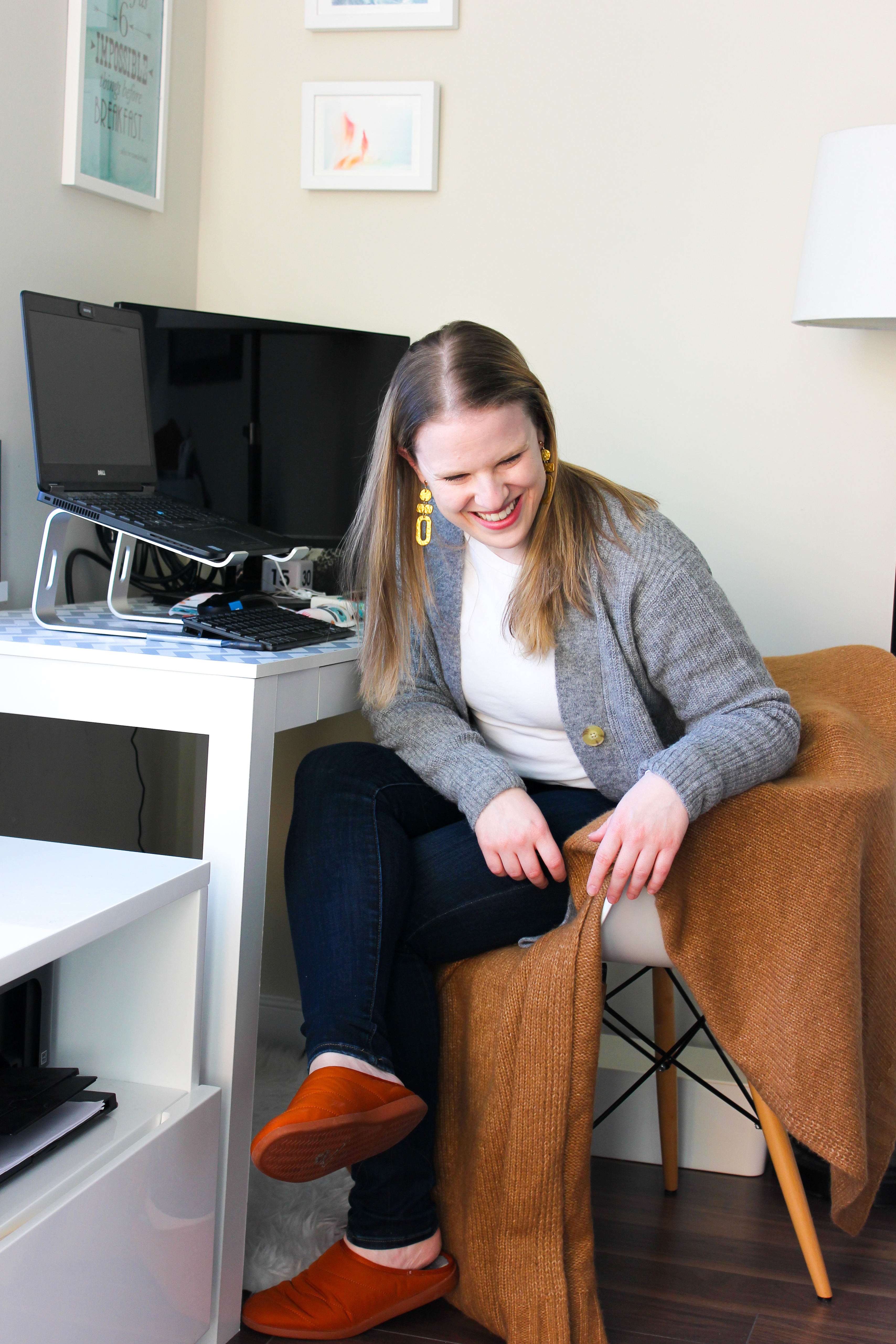 woman blogger wearing Everlane cardigan working from home