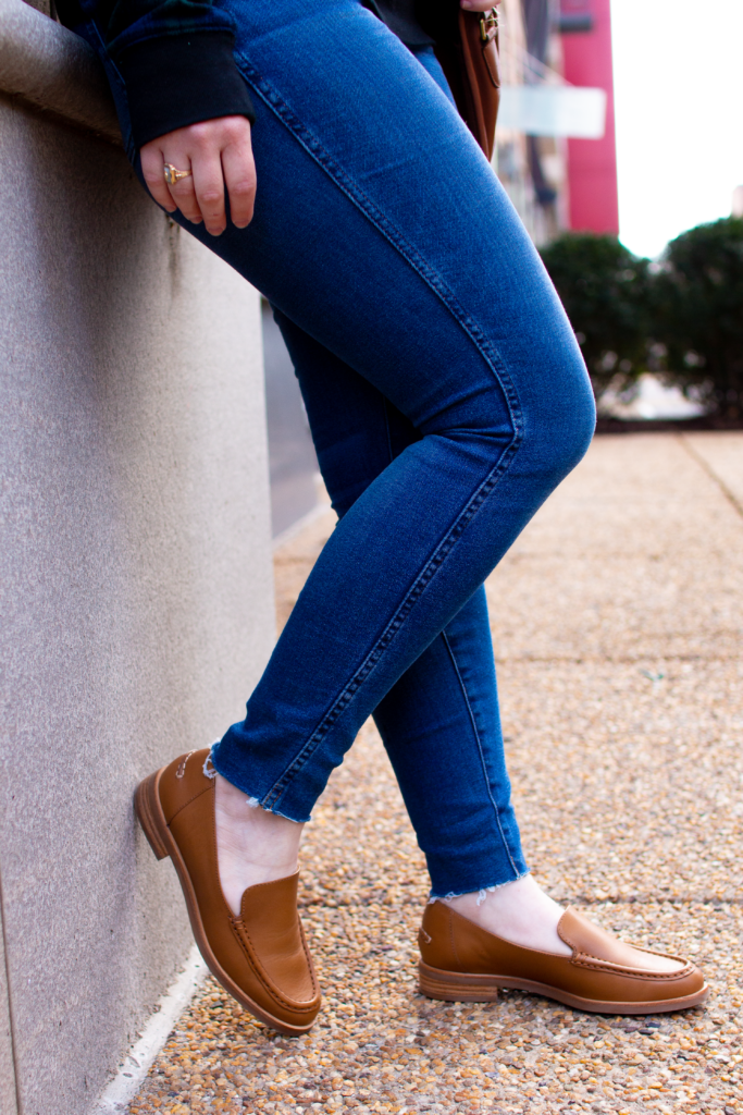 closeup of woman blogger's Everlane denim and loafers