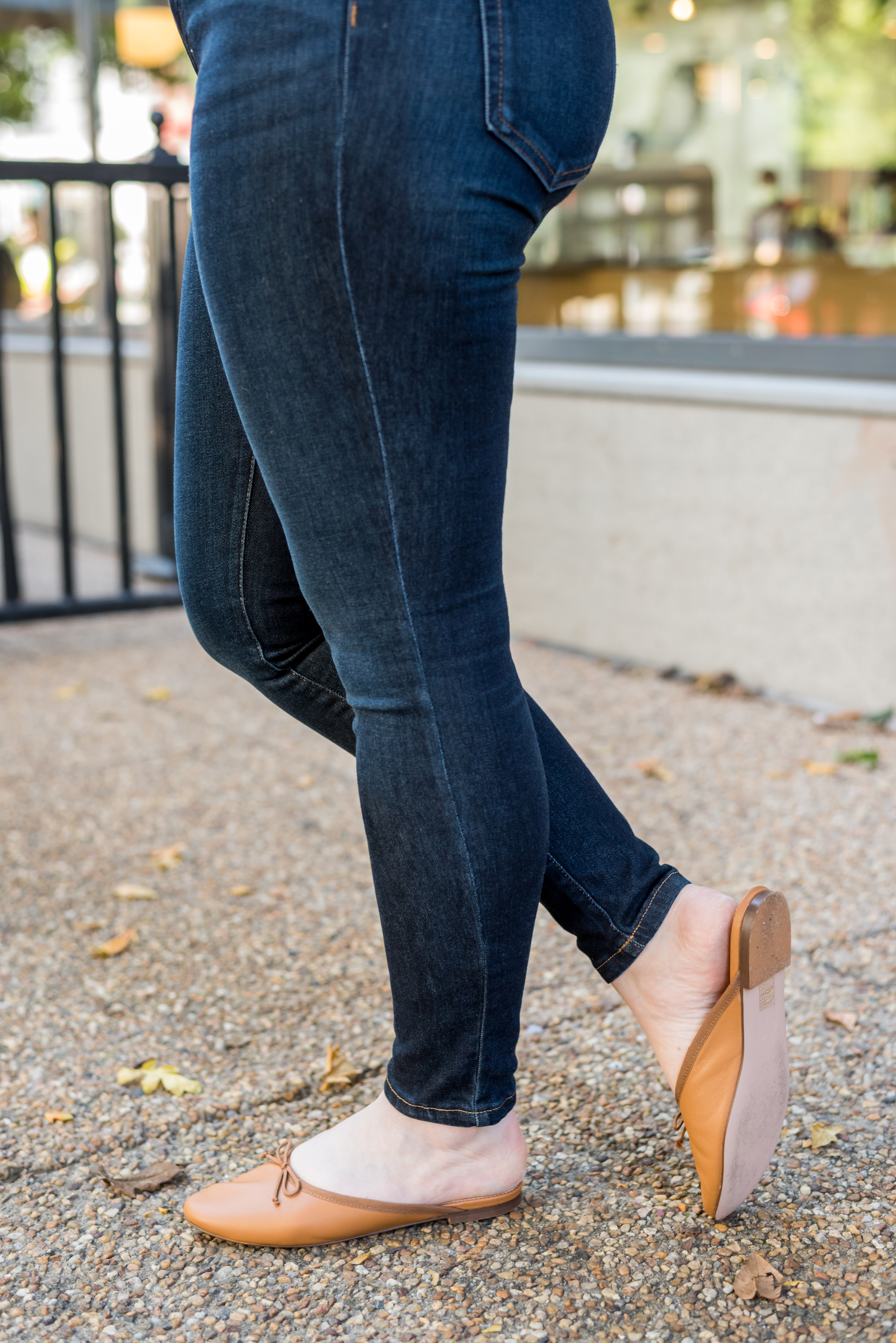 Woman wearing j.crew leather mules
