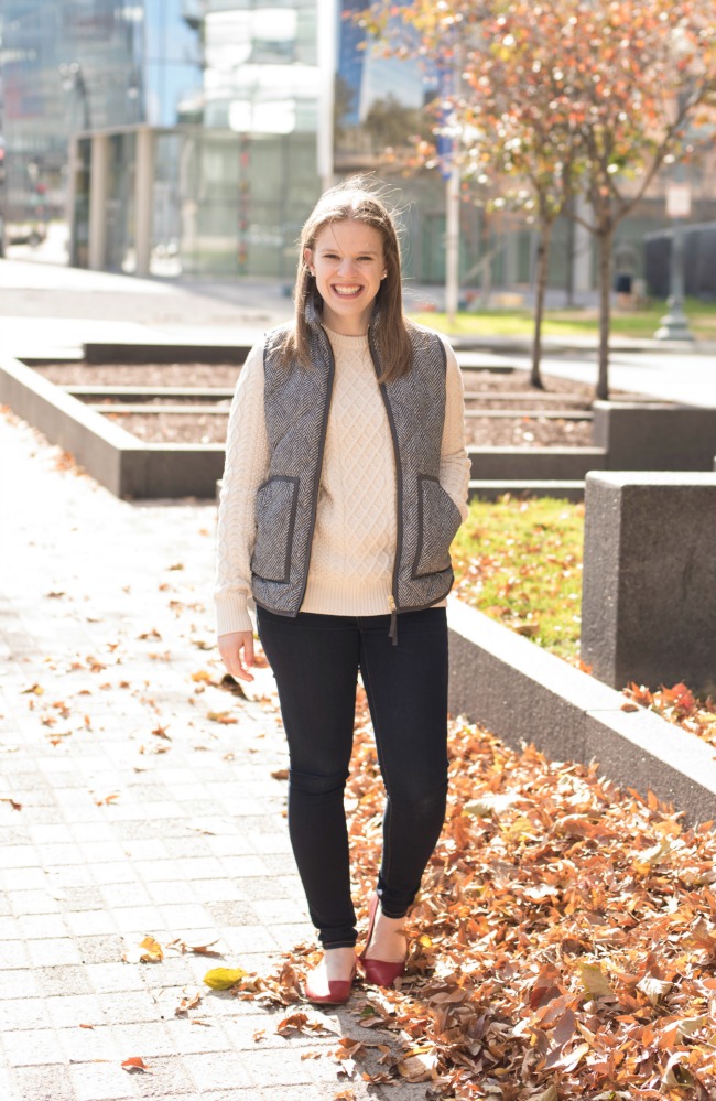 woman wearing sweater and jeans 