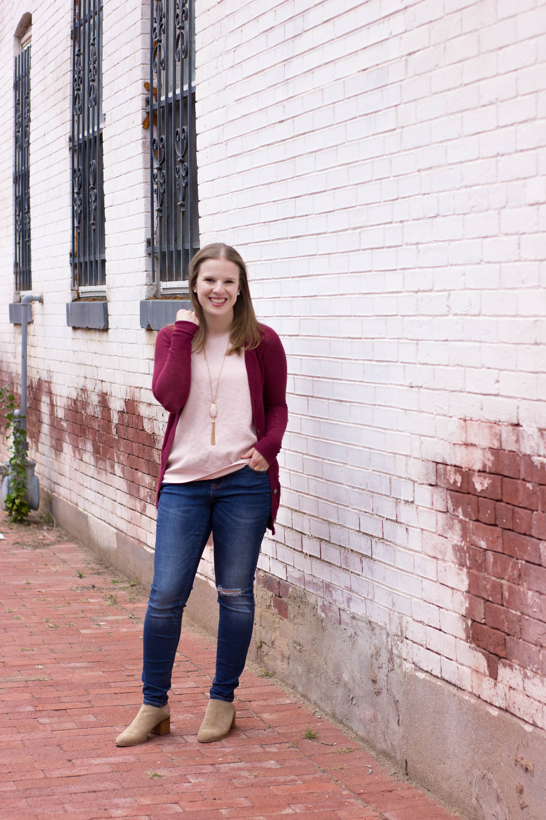 women wearing ripped skinny jeans with mule/clog hybrid 