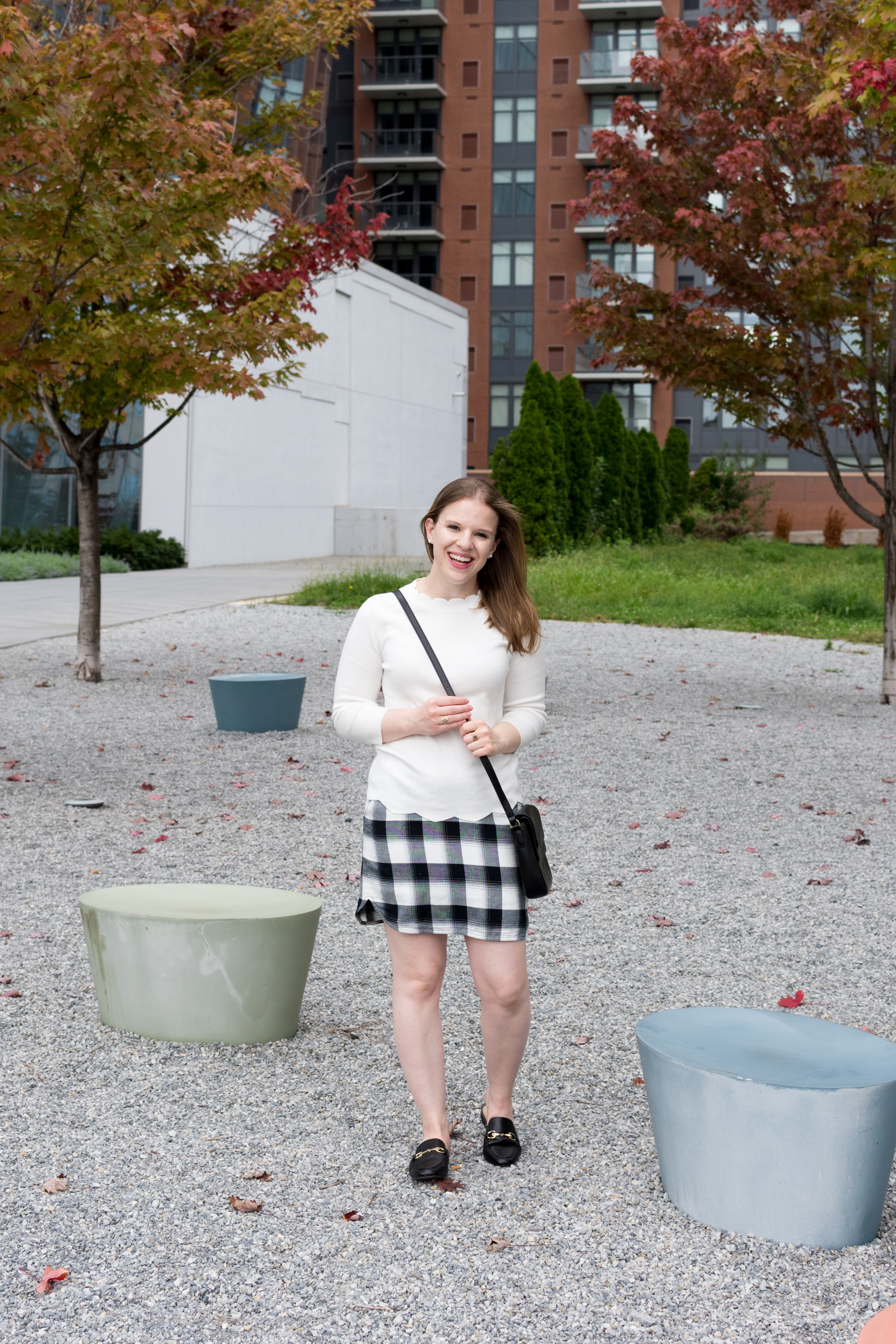 DC woman blogger wearing plaid skirt