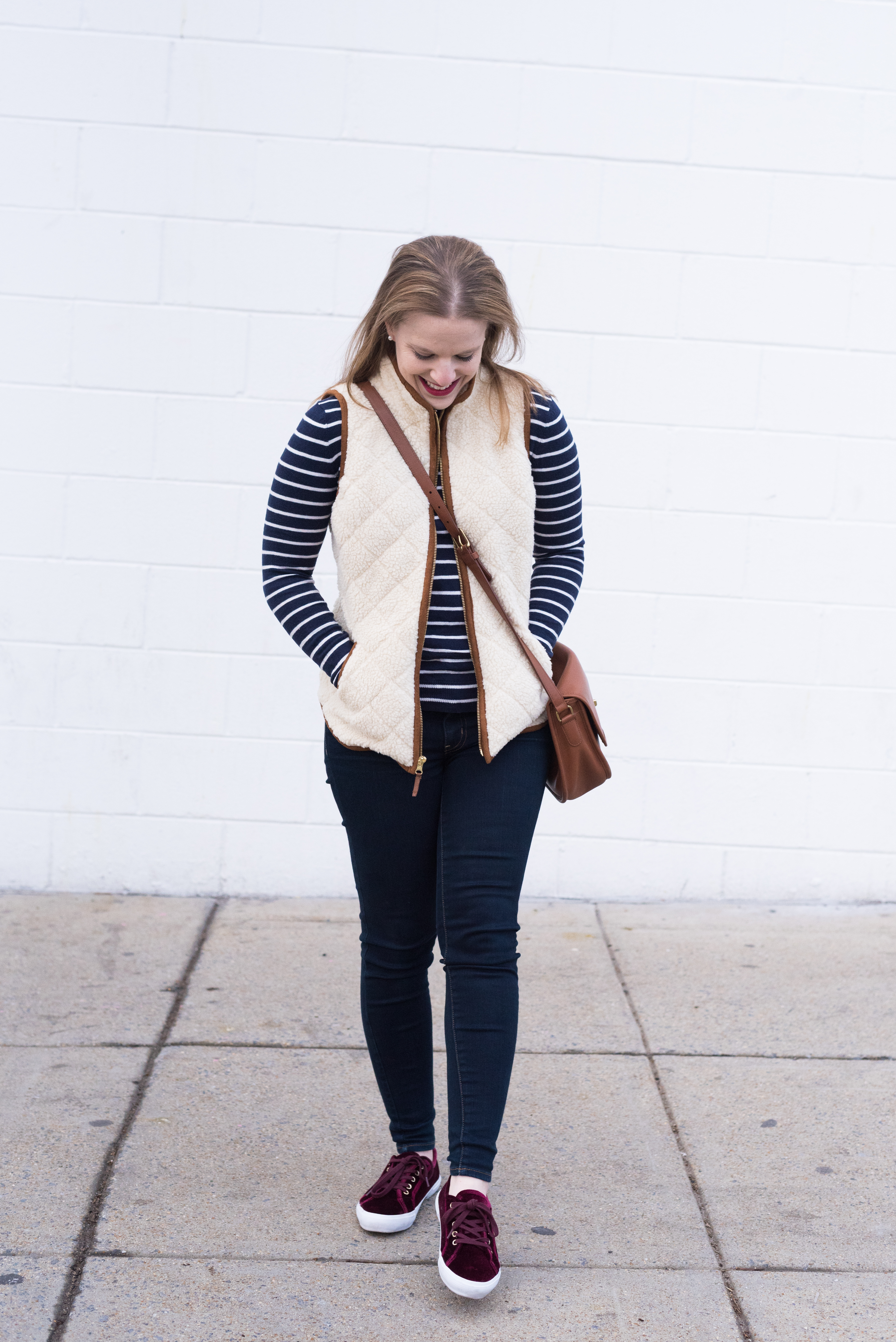 What I Learned From You | Something Good, @danaerinw , women, fashion, clothing, style, clothes, fall fashion, fall clothing, denim, skinny jeans, red sneakers, sherpa vest, vest, striped sweater, navy sweater, crossbody bag