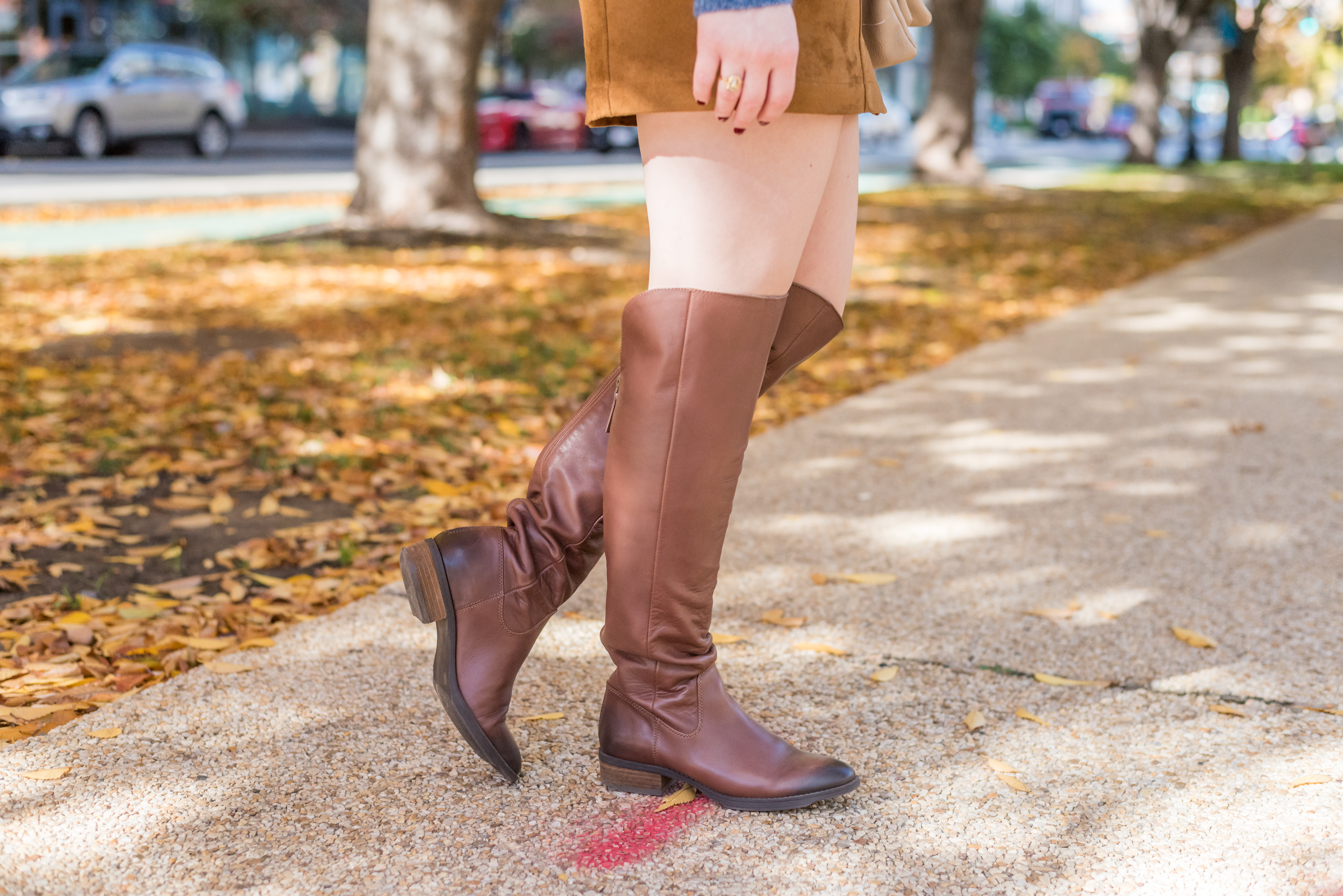 DC woman blogger wearing Over the knee boots
