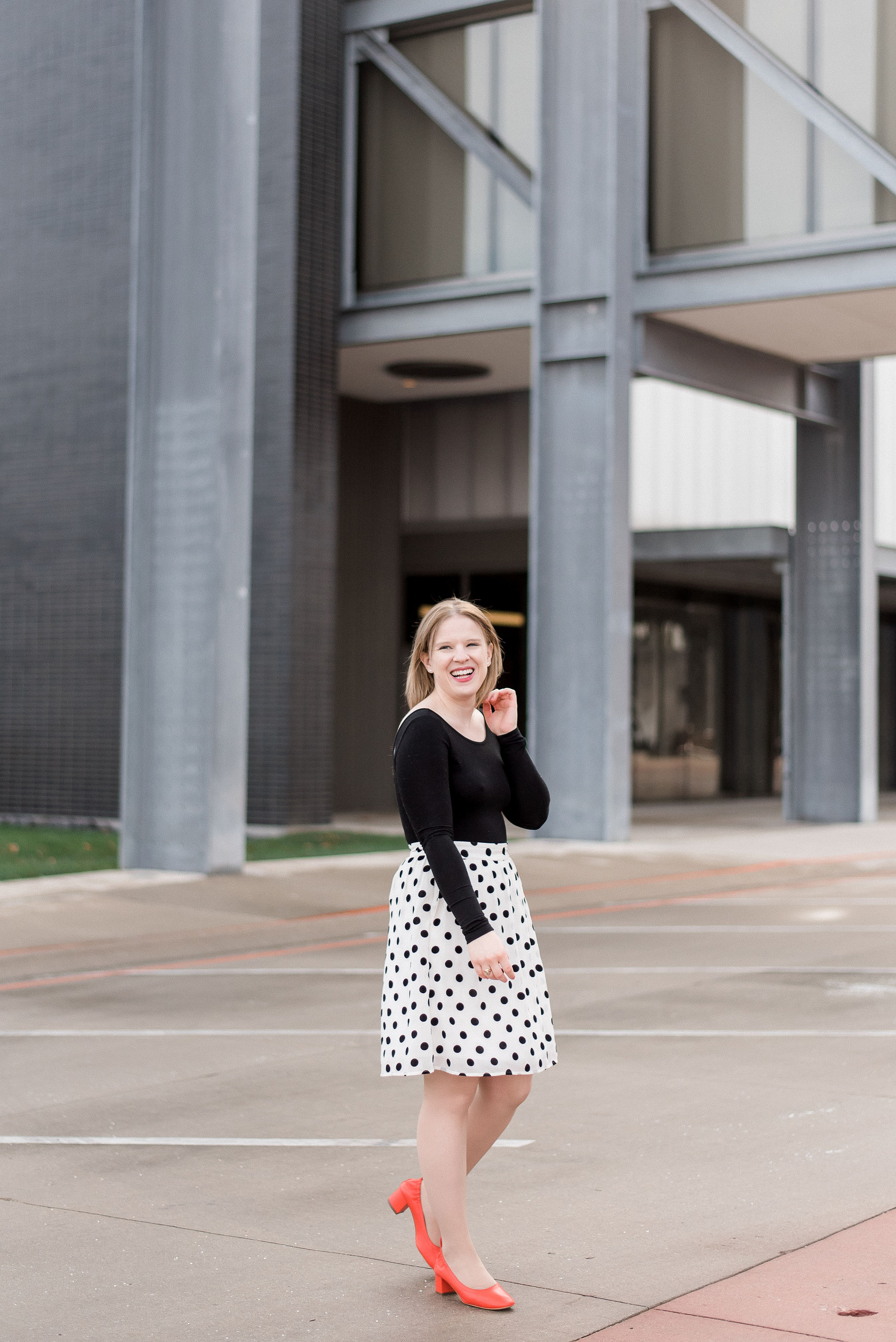 DC woman blogger wearing J.Crew polka dot midi skirt