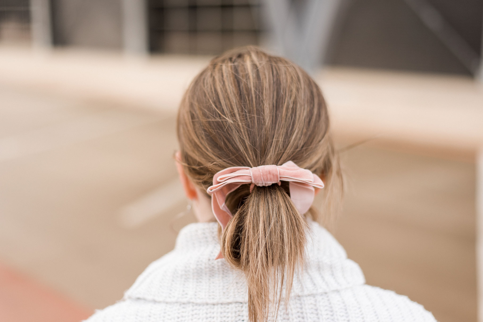 DC woman blogger wearing J.Crew Velvet bow hair tie