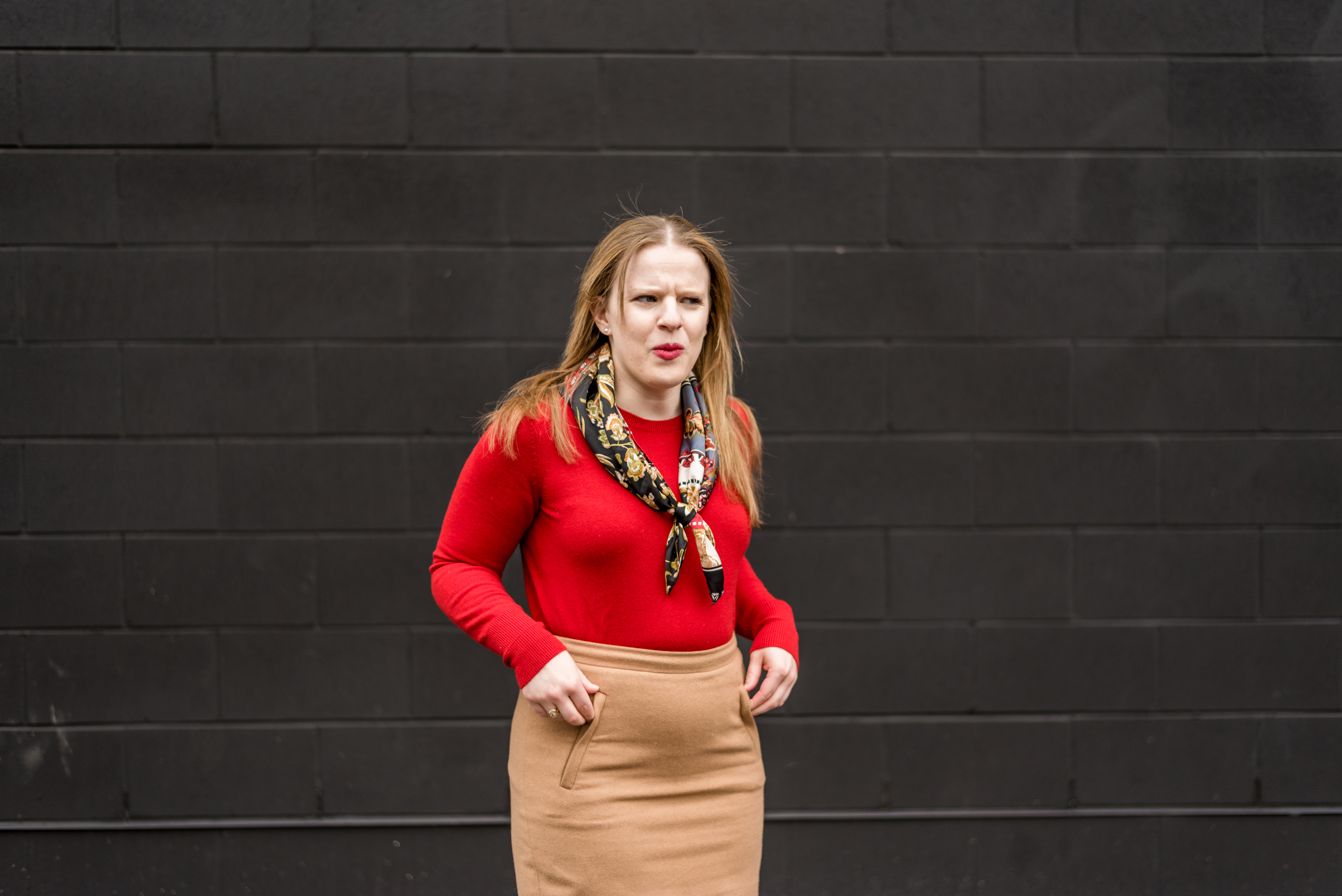 dc woman blogger wearing red crew neck sweater and tan skirt - blogger blooper post