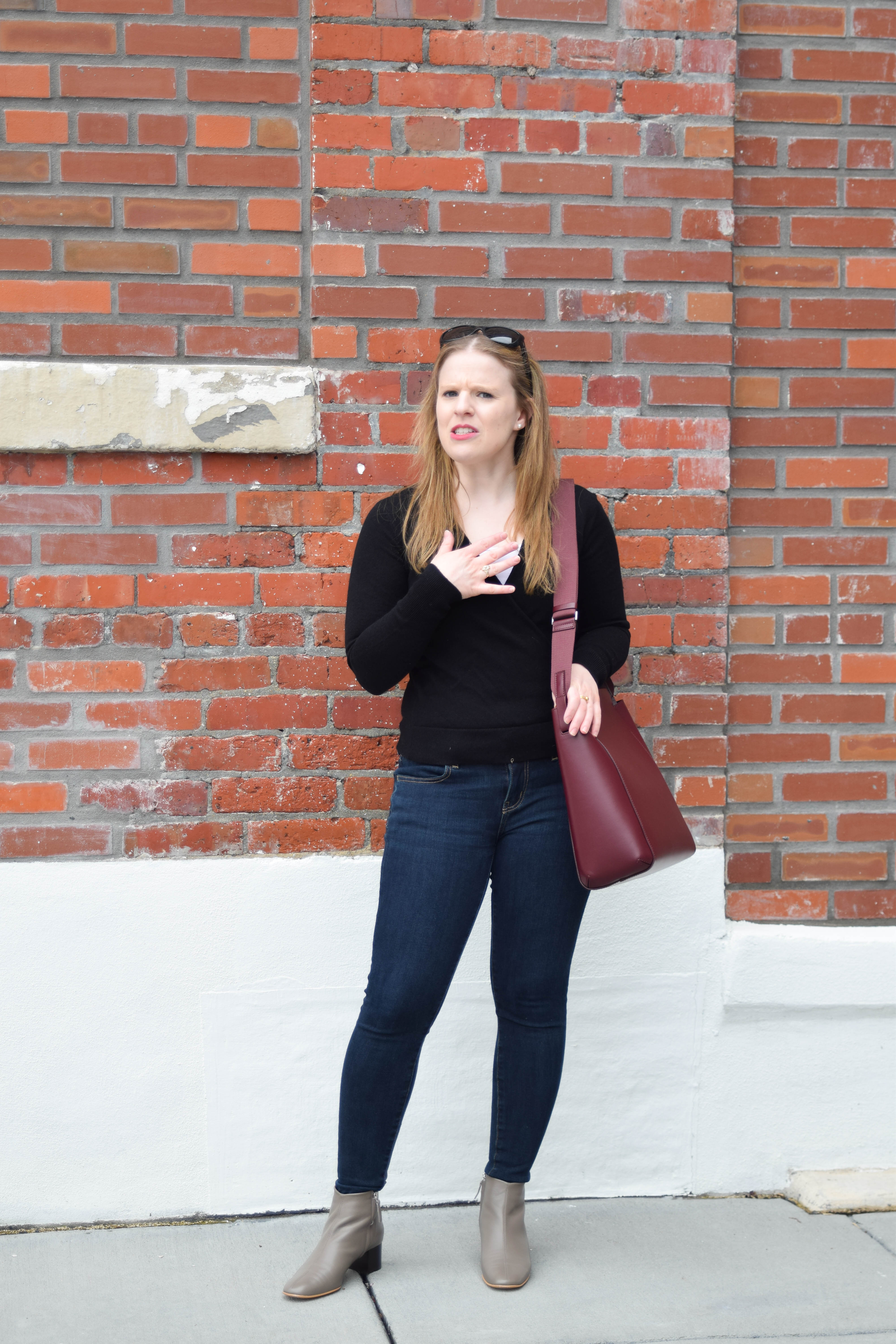 dc woman blogger wearing black sweater and jeans