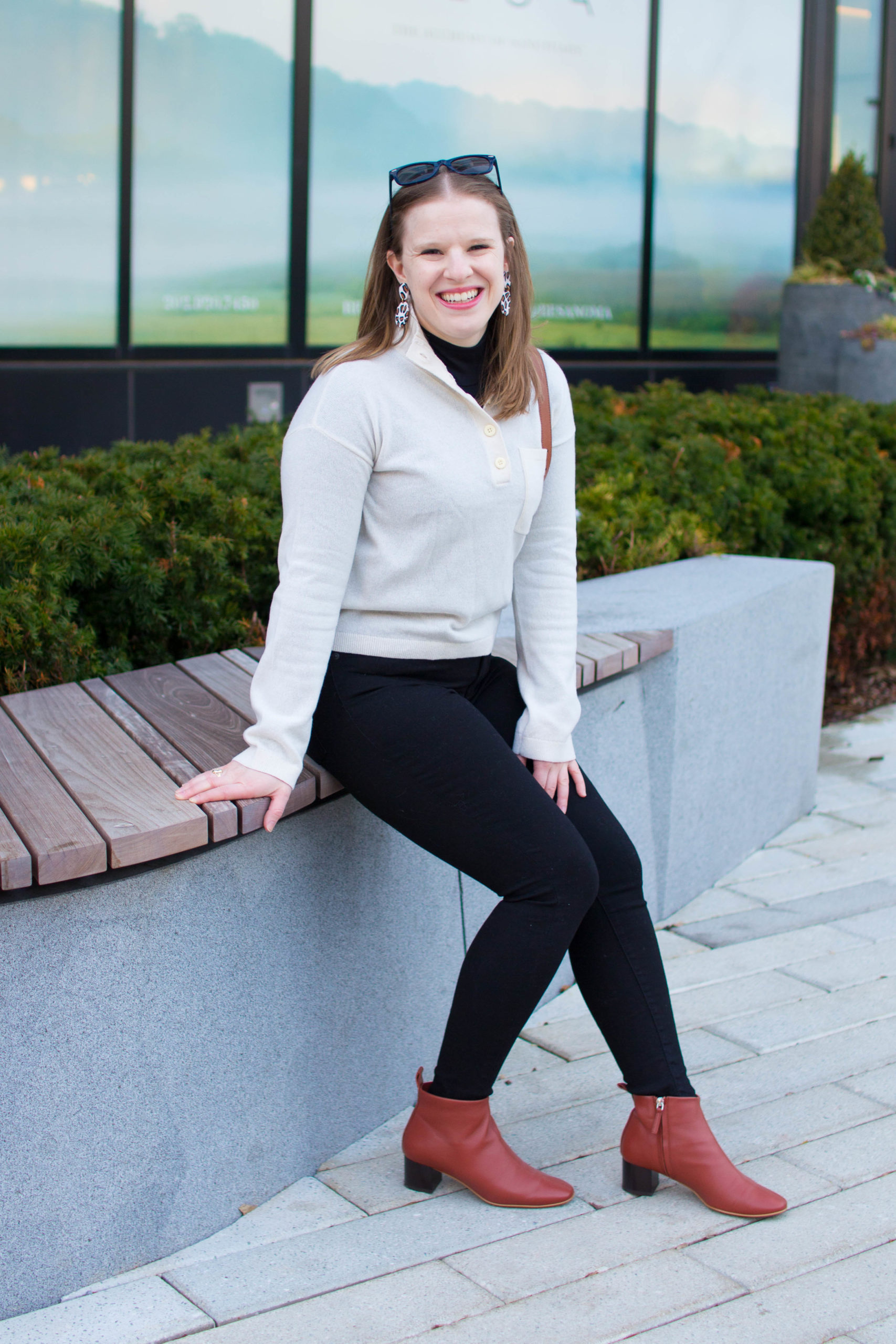 woman showing How to Style White Sweaters from Everlane Collar Sweater with jeans and red shoes