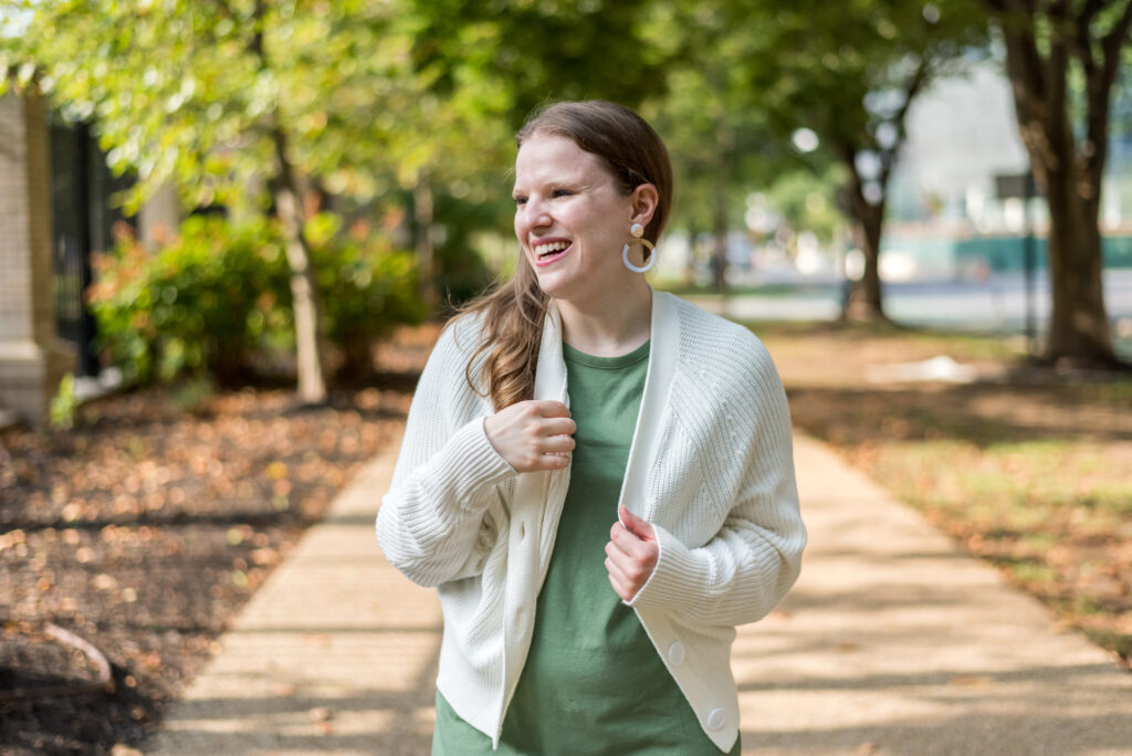 woman blogger wearing white gap cardigan over t-shirt dress