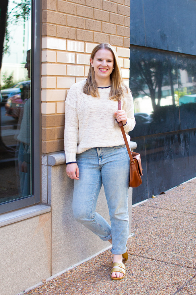 woman blogger wearing denim and sweater top