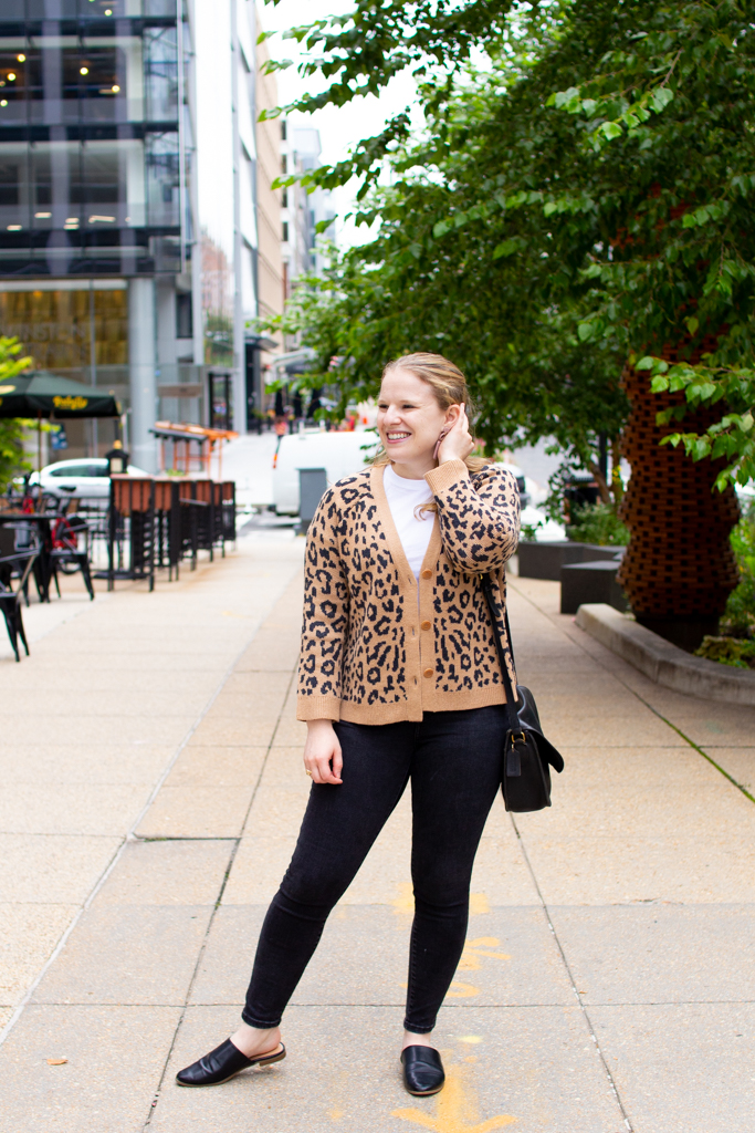 woman blogger wearing leopard print cardigan