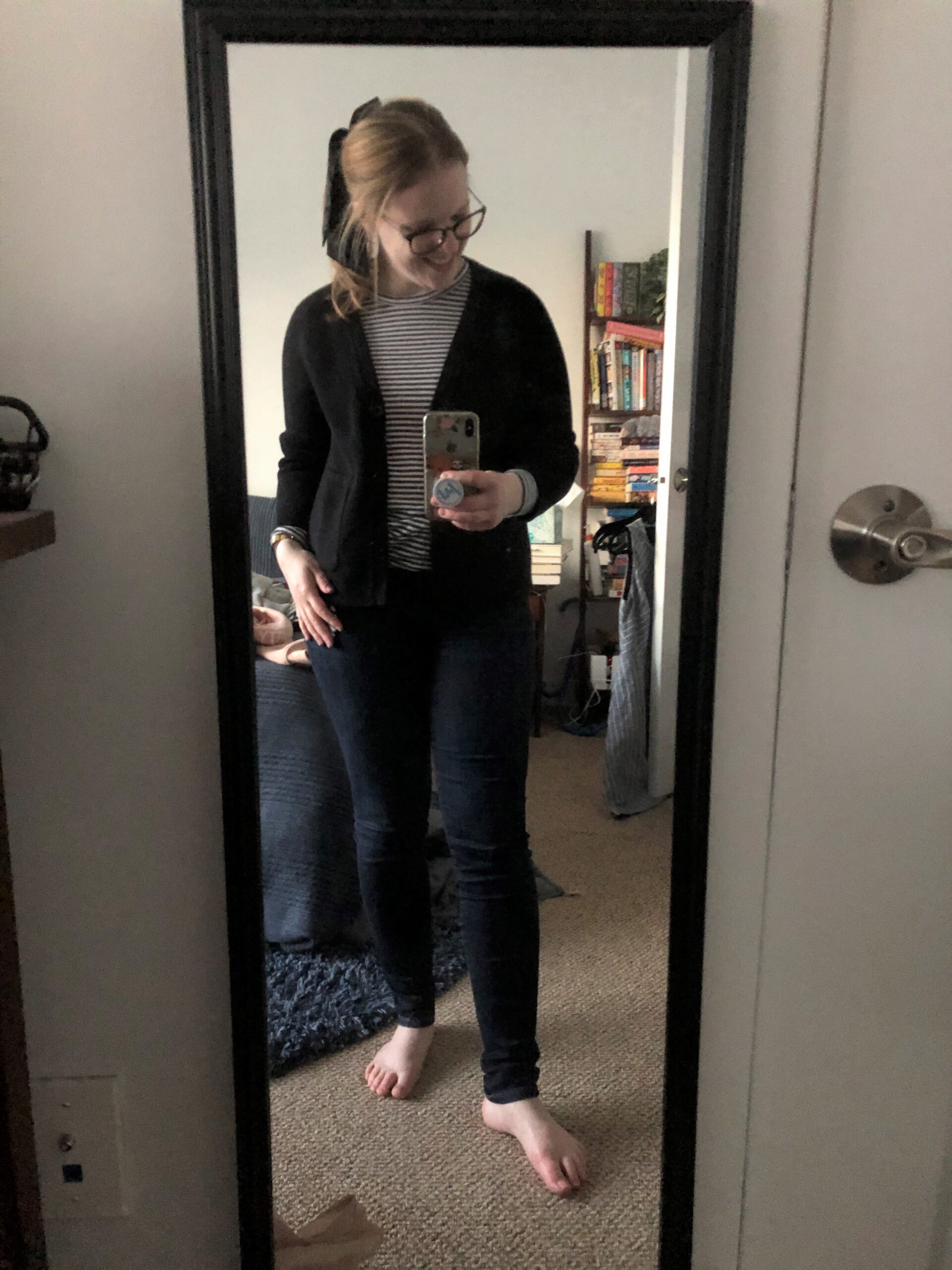 woman blogger taking mirror selfie and wearing Madewell shirt with J.Crew Cardigan
