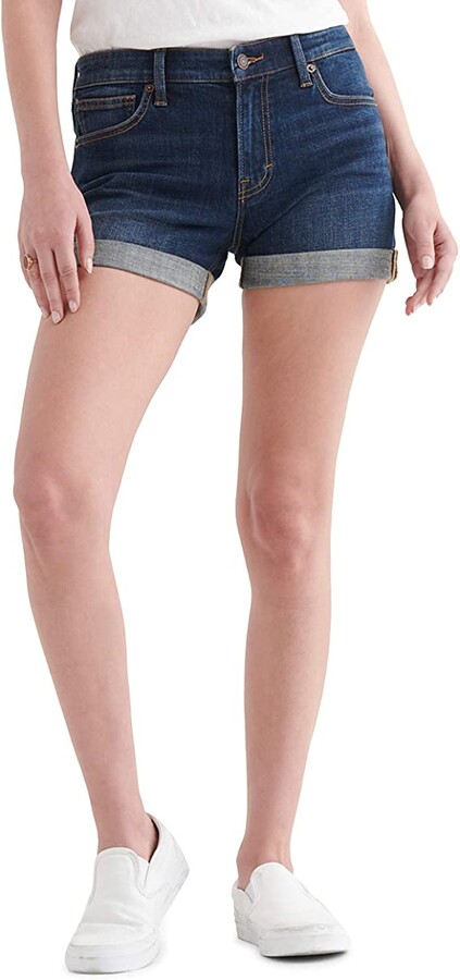 woman wearing denim shorts