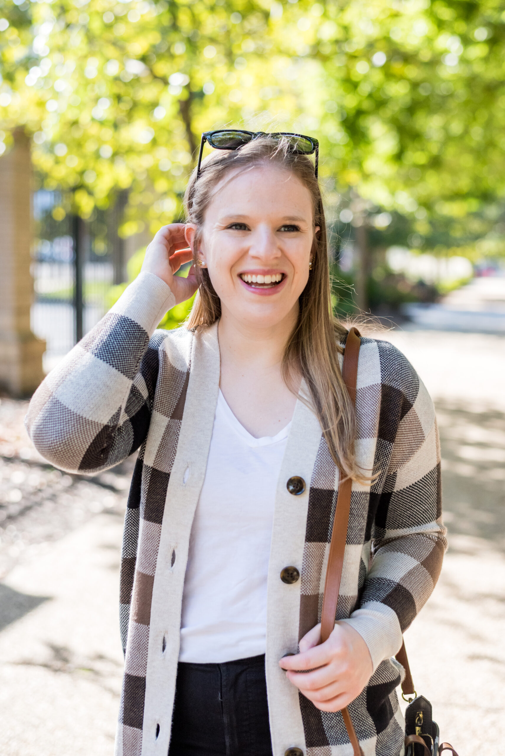 women wearing loft black and tan cardigan