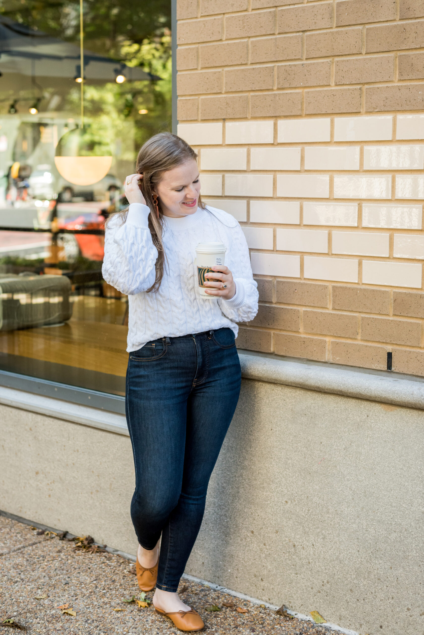 Woman wearing madewell skinny jeans