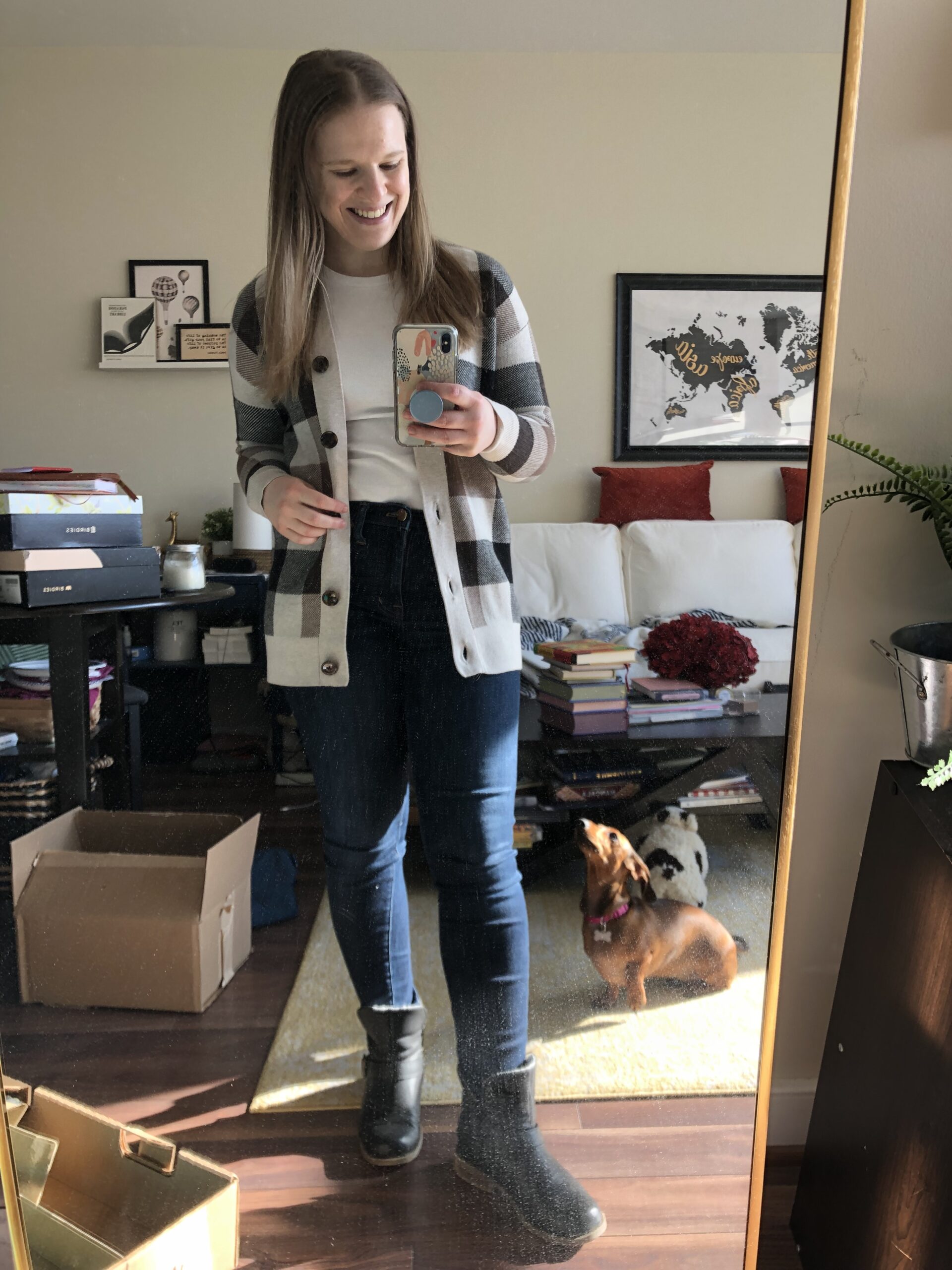woman blogger wearing plaid cardigan