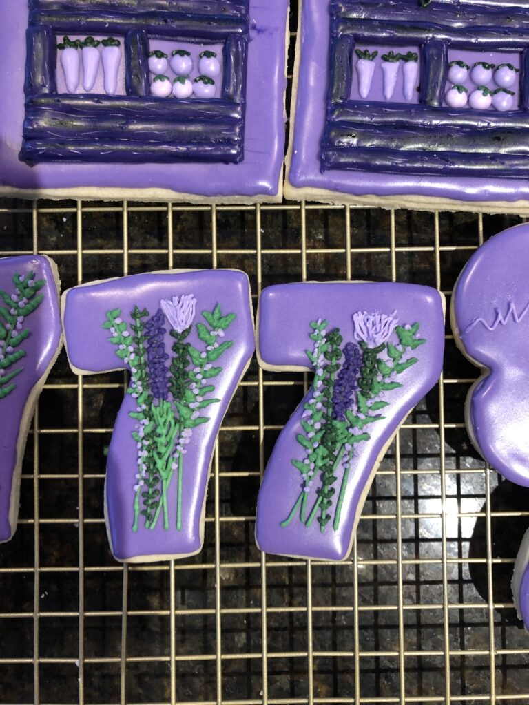 number seven sugar cookie with flowers, plants, and bouquets 