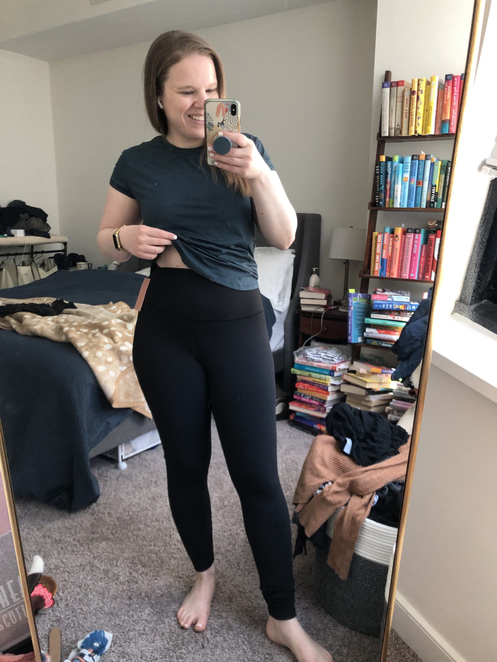 woman blogger wearing Quince Ultra-Form Performance Legging in black
